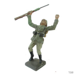 Lineol Soldat stehend mit Gewehr, rückwärts fallend