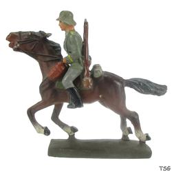 Lineol Kavallerist auf Galopp-Pferd, Gewehr auf dem Rücken