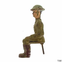 Lineol Soldat sitzend